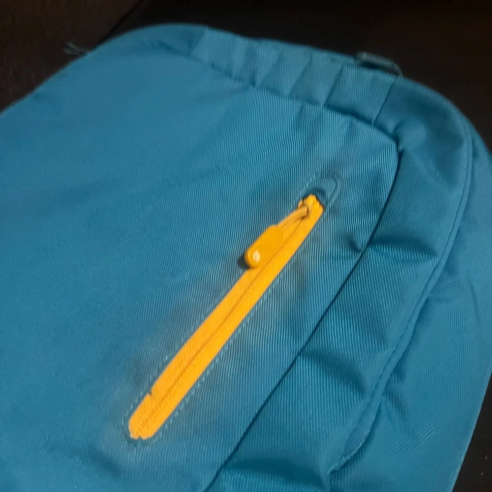 Incase Teal Backpack with Yellow Zipper